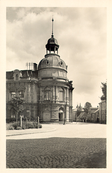 This picture postcard shows the front of the post office building built in 1899 in the Poštovní ulice-street.