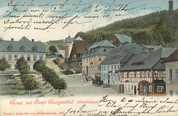This picture postcard shows the houses on the southwestern part of the square and in the adjacent street which leads under the Calvary Hill.