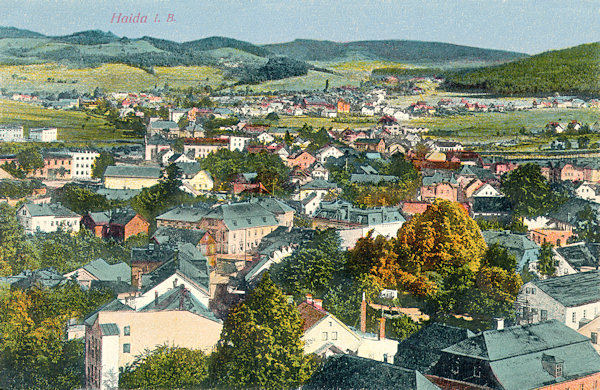 On this picture postcard we see the Arnultovice village as seen from the tower of the church Assumption of the Virgin Mary.