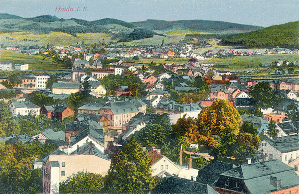 On this picture postcard there is the view of the northwestern part of the town with Arnultovice village as seen from the tower of the church Asumption of the Virgin. In the foreground there are the houses of the former street Gartengasse, at present named Purkyňova ulice.