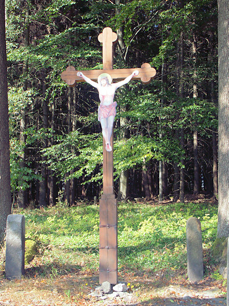 Holzkreuz mit Christusbild.